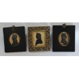 Two 19th century silhouette portrait miniatures, both gentlemen in profile, one inscribed verso