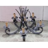 An iron work five branch hanging ceiling light with simple scroll and hammered detail, together with