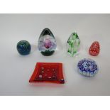 A collection of various paperweights, together with a glass pin tray with Millefiori canes (6)