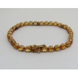 18ct citrine and diamond line bracelet, 17.5cm long approx (excluding inner clasp), 10.6g
