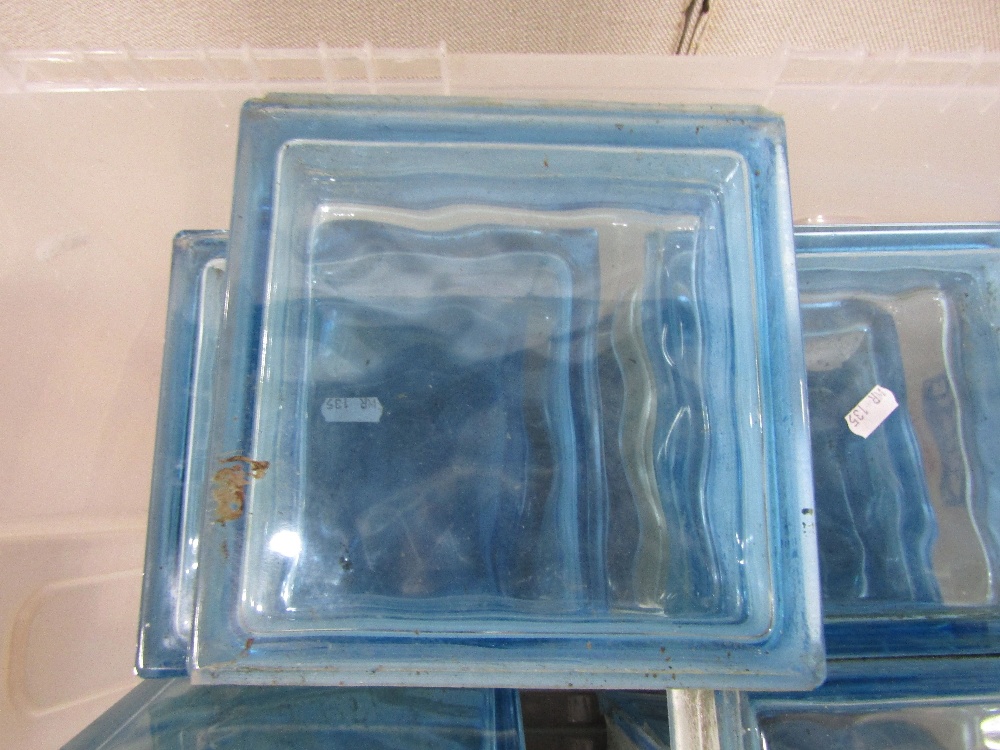 Eleven moulded blue tinted glass bricks, 9 inches square - Image 2 of 2