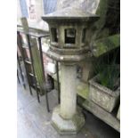 A good quality weathered composition stone, three sectional bird table of octagonal form, with