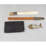 Two antique letter knives, one with otters paw mount, silver collar and ivory blade dated 1900,