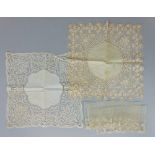 19th century bobbin lace handkerchief together with a 19th century silk handkerchief featuring the