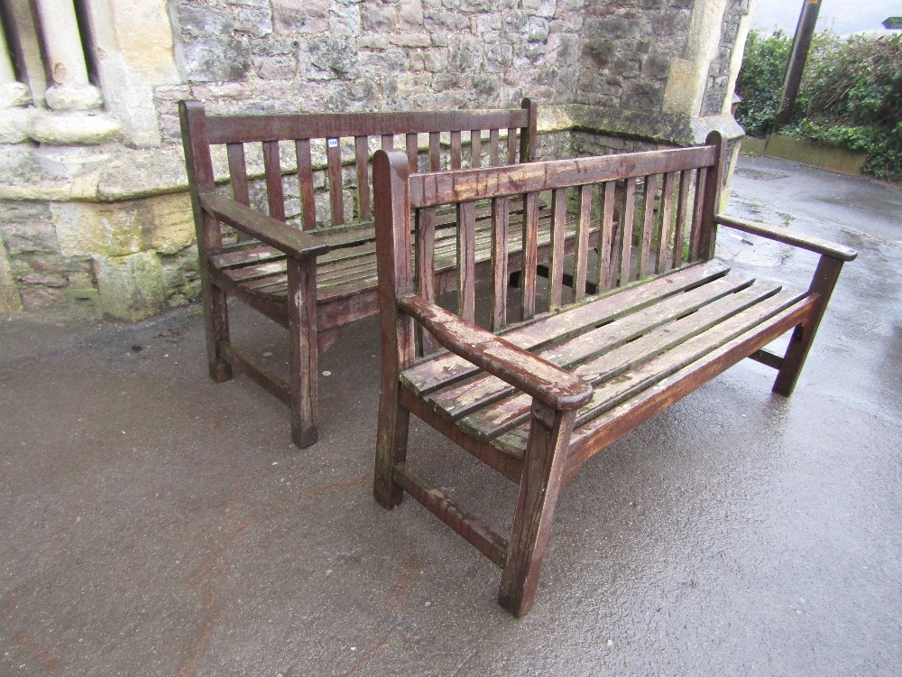 Two similar Lister stained teakwood three seat garden benches, with slatted seats and back, 160cm