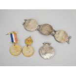 Two Queen Victoria Diamond Jubilee lapel medallions cased and a bracelet formed from four Maria