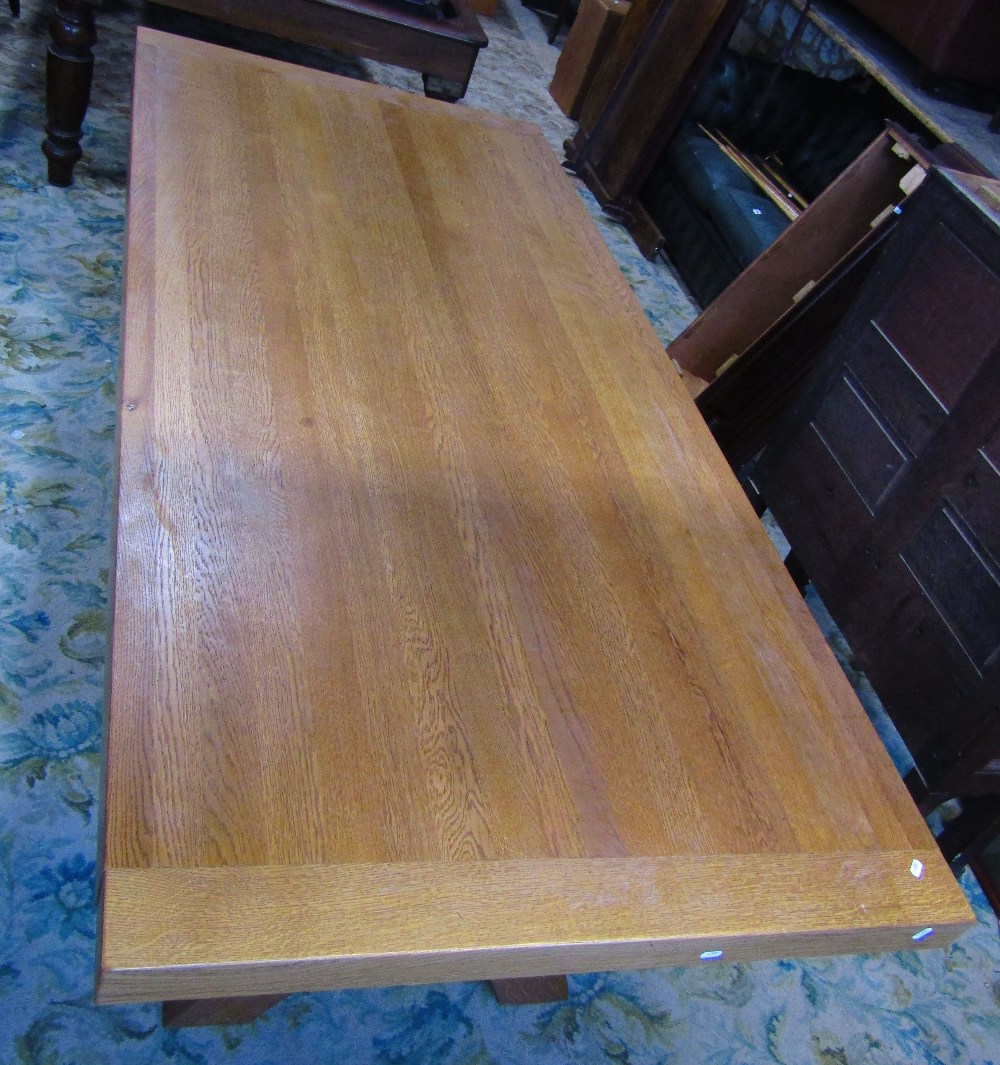 A good quality contemporary light oak dining table of rectangular form raised on X framed - Image 2 of 5