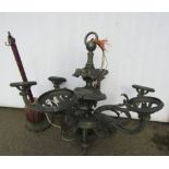 An antique cast metal six branch hanging ceiling light/electrolier, with scrolling acanthus and