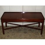 A reproduction Georgian style mahogany occasional table of rectangular form with moulded tray top