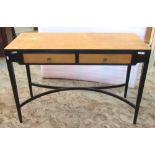 A mid-20th century low side table fitted with two frieze drawers with stripped fronts and top,