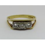 18ct three stone diamond ring, size L/M, 4.1g