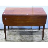 An early 19th century mahogany Pembroke table, fitted with the usual arrangement of one real and one