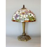 Tiffany style leaded glass table lamp, decorated with butterflies amidst foliage, 45cm high