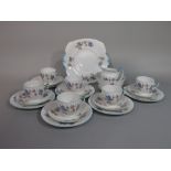 A collection of Royal Albert Crown China teawares with blue bird and blossom detail comprising