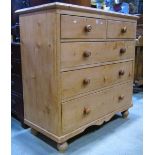 A substantial Victorian stripped and waxed pine bedroom chest of two short over three long graduated