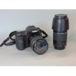 A good quality Canon EOS 40D camera with further Canon EFS17-85mm lens and another Canon 75-300mm