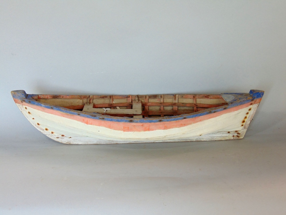 Good quality 22" open deck boat, with painted canvas detail, 55cm long