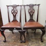 A set of six Edwardian mahogany dining chairs in the Georgian manner with carved and pierced