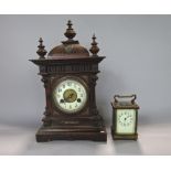 Continental twin train mantle clock with enamelled chapter ring and striking on a gong, 40 cm