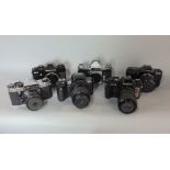 Six single lens reflex cameras to include Pentax and Olympus Auto Focus, Chinon and Praktica, four