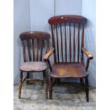 A 19th century Windsor elm and beechwood turned spindle back armchair, together with three further