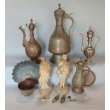 A collection of four Eastern type ewers, together with further Eastern metalwares, a pair of plaster