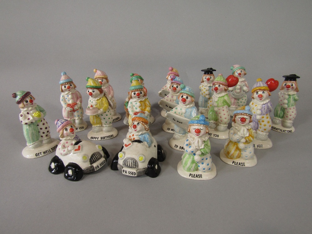 A collection of eighteen Beswick Little Lovables figures with various inscriptions including Happy