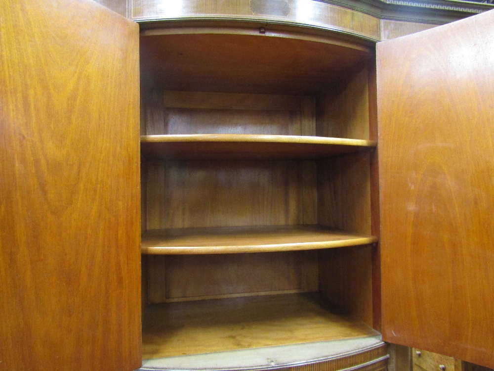 A substantial Edwardian mahogany triple wardrobe, the central section of bow-fronted outline, fitted - Image 5 of 5