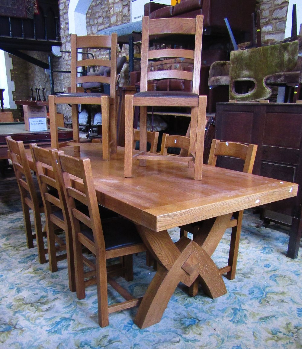 A good quality contemporary light oak dining table of rectangular form raised on X framed - Image 3 of 5