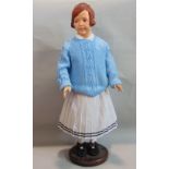 Vintage papier mache standing girl doll, imperial dress upon a wooden plinth, possibly for