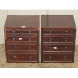 A pair of small 19th century mahogany chests of five long graduated drawers (once part of a desk/