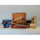A mahogany box containing a collection of scientific instruments and thermometers, scientific