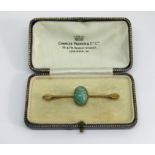 15ct Egyptian Revival scarab beetle bar brooch, set with a carved chrysoprase scarab with
