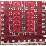 Good quality full pile Persian rug with geometric panelled decoration upon a red ground, 200 x