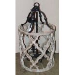 A large contemporary Gothic style hanging lantern, the cylindrical open painted and distressed