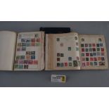 Three albums containing an extensive quantity of British and worldwide stamps including 1d red