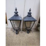 A pair of Victorian style street lantern hoods of square tapered form, with glazed panels and raised