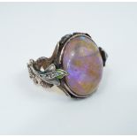 19th century cabochon opal and rose cut diamond ring, with ornately engraved shank in silver and