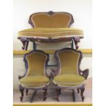 Graduated pair of Victorian walnut drawing room chairs with carved and pierced scrolled detail