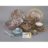 An extensive collection of oriental Thousand Flower type pattern wares including oval serving plate,