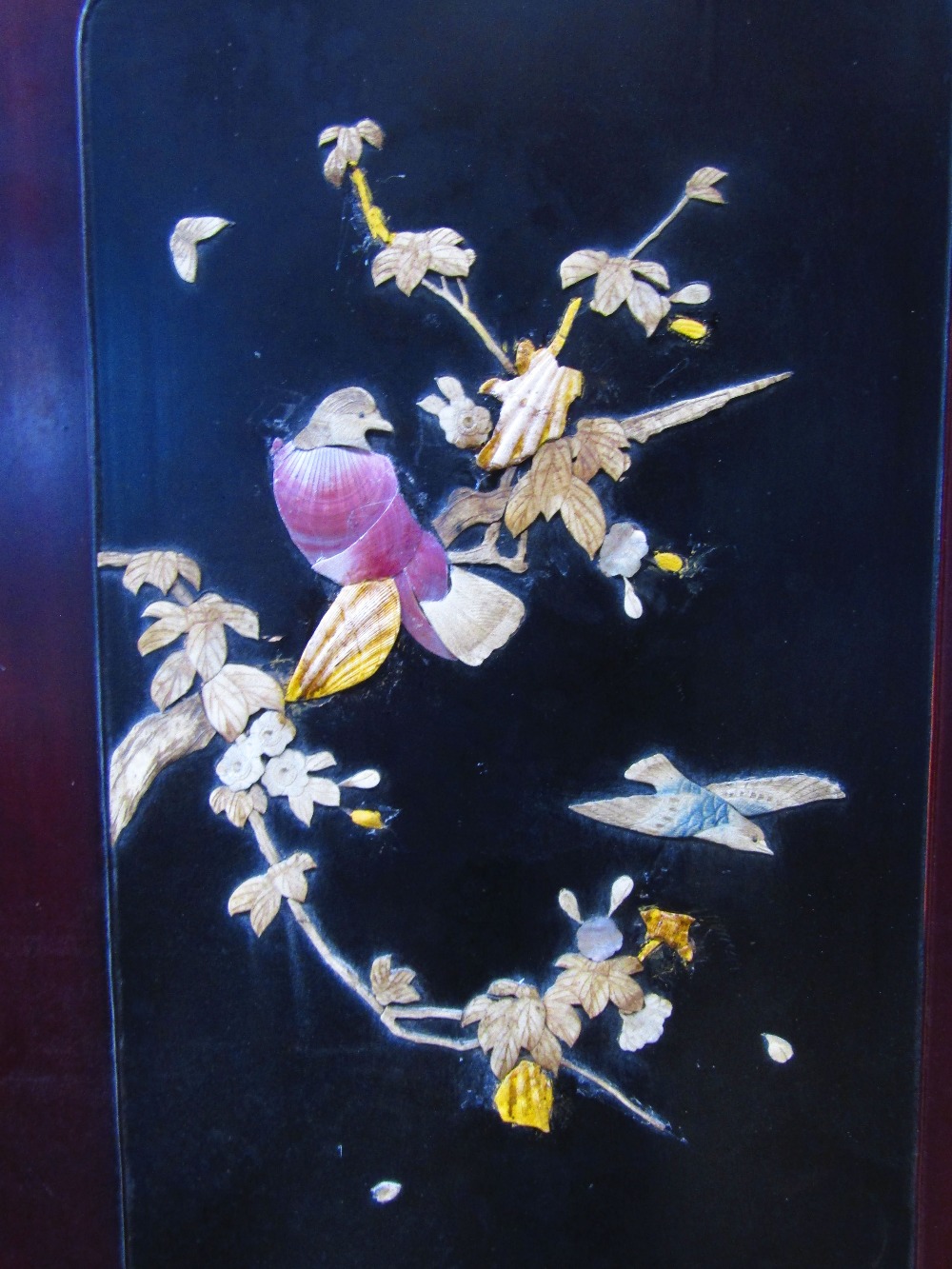 A Japanese freestanding two fold screen, the ebonised frame with carved foliate and bird detail - Image 2 of 3