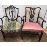 A Regency period open shield back elbow chair, the wide seat within swept arms, pierced shield