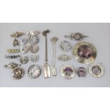 Collection of Scottish / Scottish style silver brooches to include a large example set with amethyst