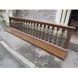 A substantial Victorian oak prayer or communion rail, the moulded top supported on turned spindles