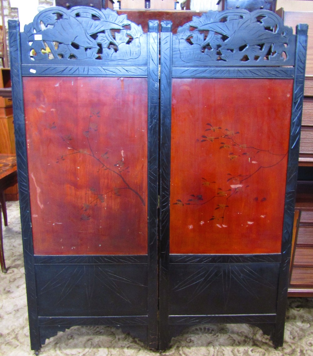 A Japanese freestanding two fold screen, the ebonised frame with carved foliate and bird detail - Image 3 of 3