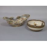 An early 20th century continental bowl in the Zsolnay Pecs manner, of oval form with pierced and