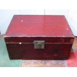 A Chinese travelling box with red lacquered finish, cast brass plate with inscriptions, 76 cm wide