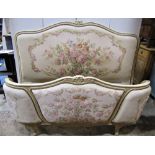 A French double bedstead with machine woven floral tapestry upholstered head and footboard with