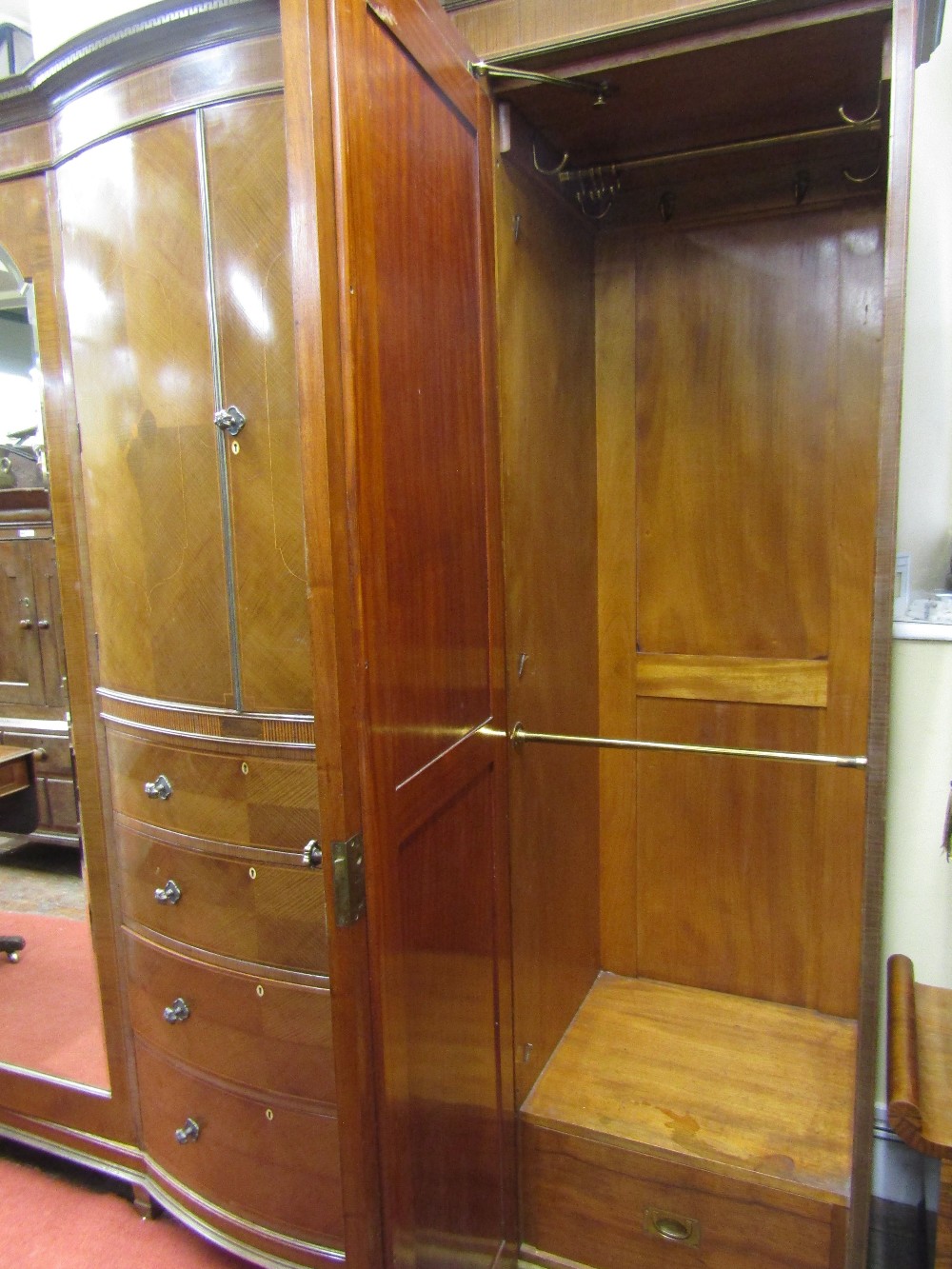 A substantial Edwardian mahogany triple wardrobe, the central section of bow-fronted outline, fitted - Image 4 of 5