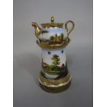 A 19th century continental three sectional teapot and stand (veilleuse) with painted continuous